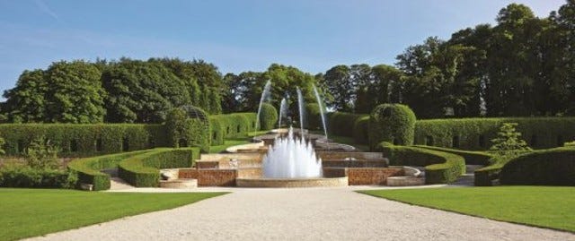 Large fountain in landscaped garden