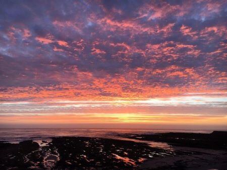 sunrise from beadnell beach house