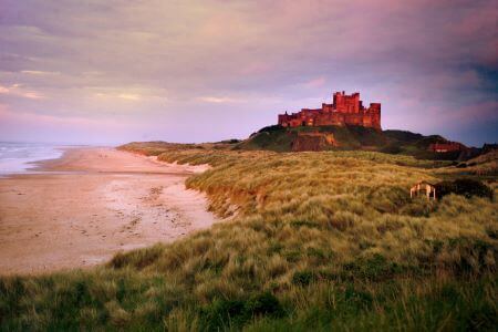 Bamburgh beach at sunset