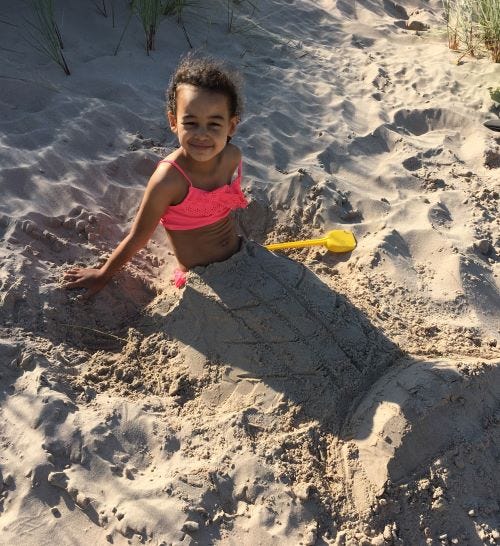 Making mermaid tails on the beach