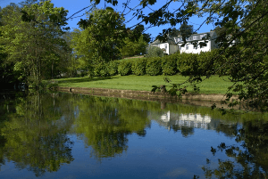 Property on hill behind river