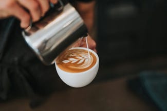 artistic coffee being poured