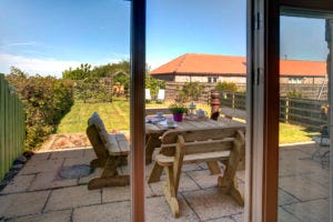 Outdoors View of the patio furniture from indoors